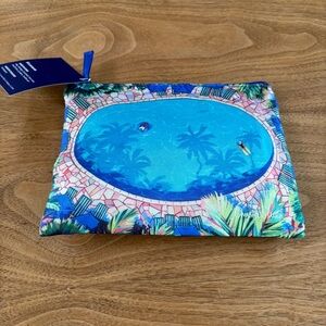 Christie Shinn pouch with travel toiletries